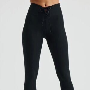 YEAR OF OURS sweat wicking slick football leggings